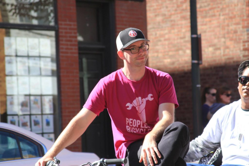 Jon Miles Sitting in Peoplesbicycle tshirt
